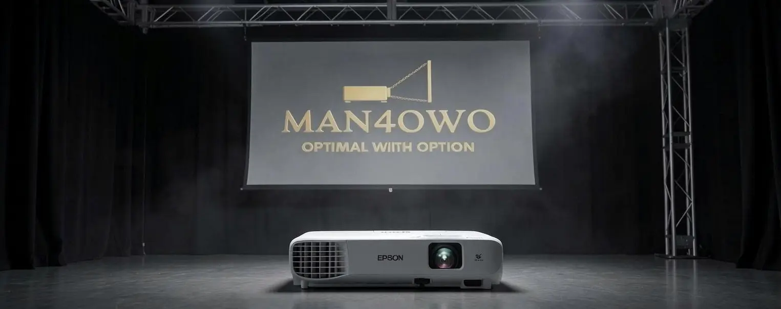 An Epson projector placed on a dark stage with a large projection screen displaying the 'MAN4OWO' branding and tagline 'Optimal With Option'. The setup suggests a professional presentation environment.